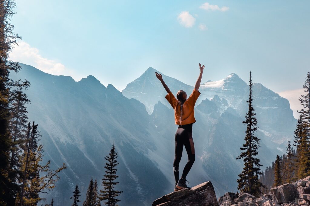 Empowered woman on mountain